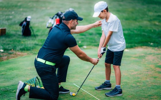 Kid playing Golf