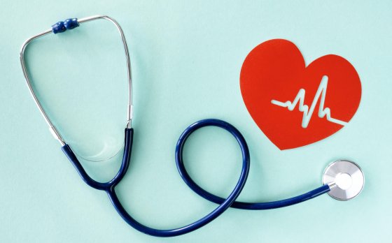 stethoscope and heart cutout with pulse