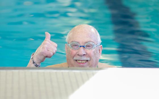 Man swimming at Maplewood Pool