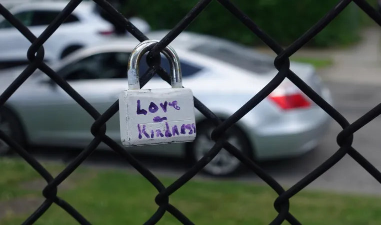 love on fence outside lewis street ymca neighborhood center