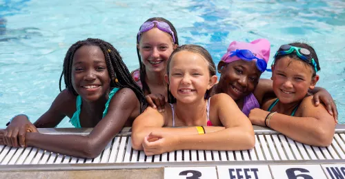 Kids Swimming in Pool